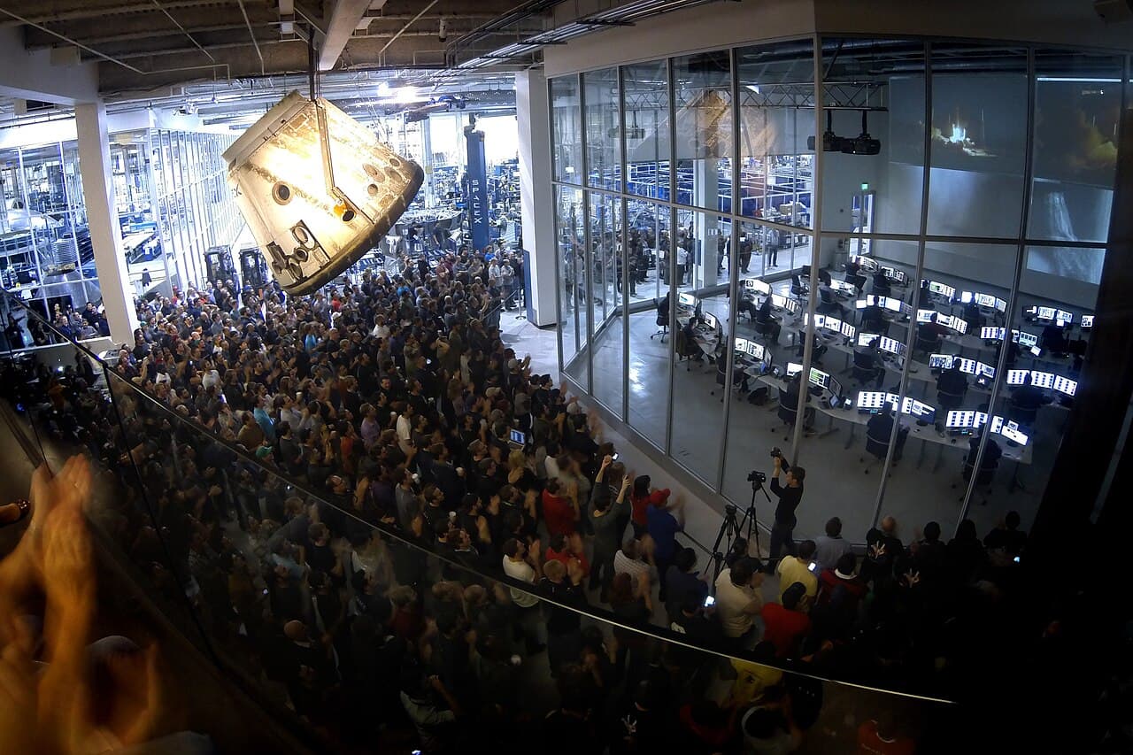 SpaceX employees watch the Falcon 9 SES-8 launch from SpaceX headquarters in Hawthorne, CA